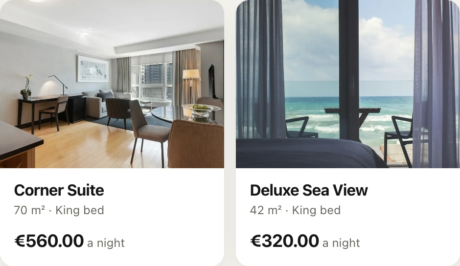 Two complete room cards with photographs, amenities and nightly prices